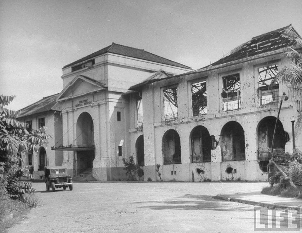 Philippine General Hospital after the Battle of Manila, 1945 — bullet holes visible across the facade